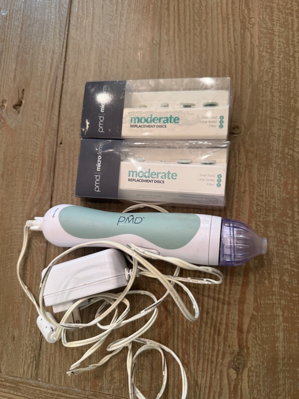 PMD Microdermabrasion Device in Mint and Purple with Replacement Discs
